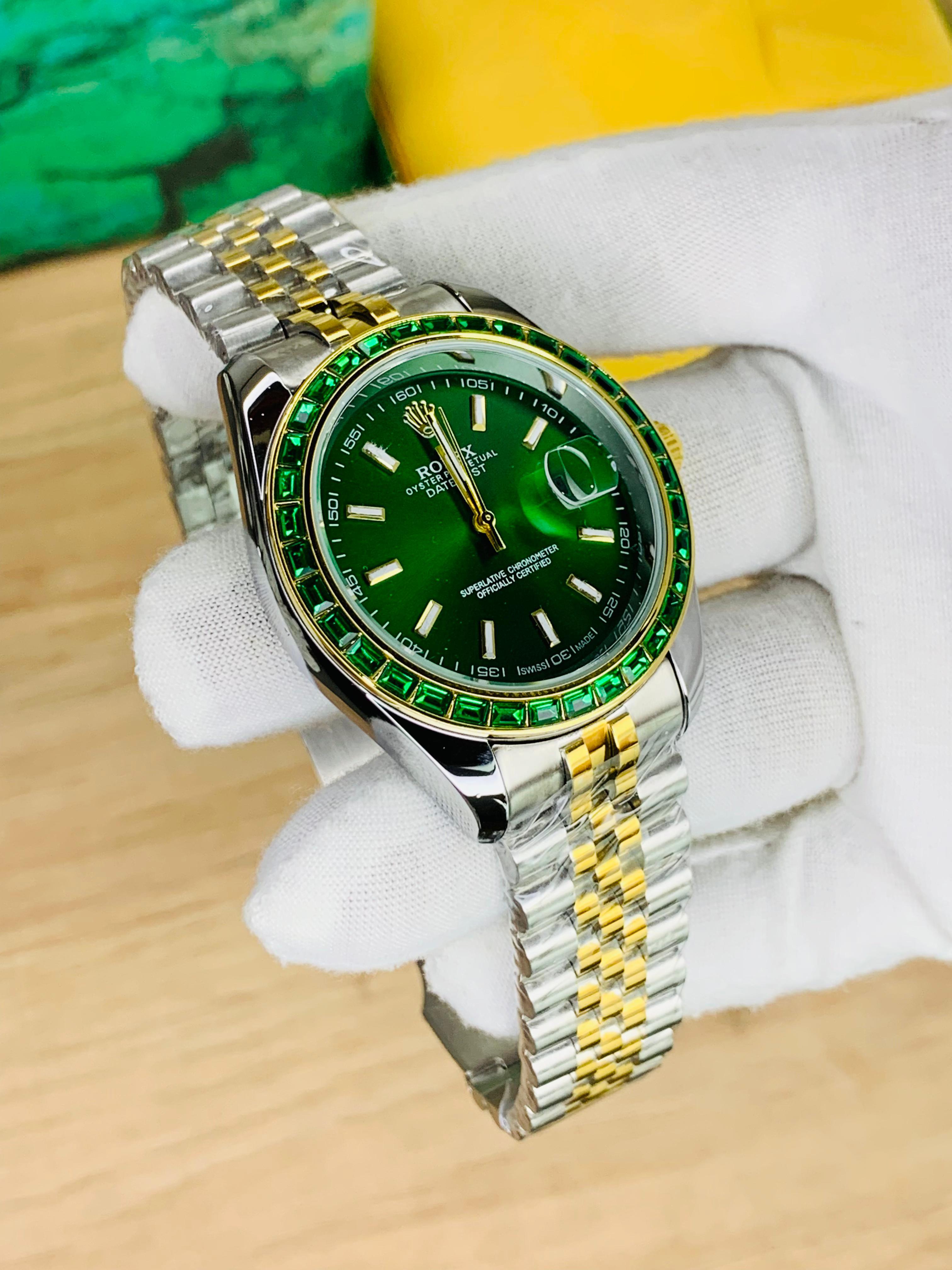 Two-tone stainless steel jubilee chain luxury men’s watch with green stone dial and date display